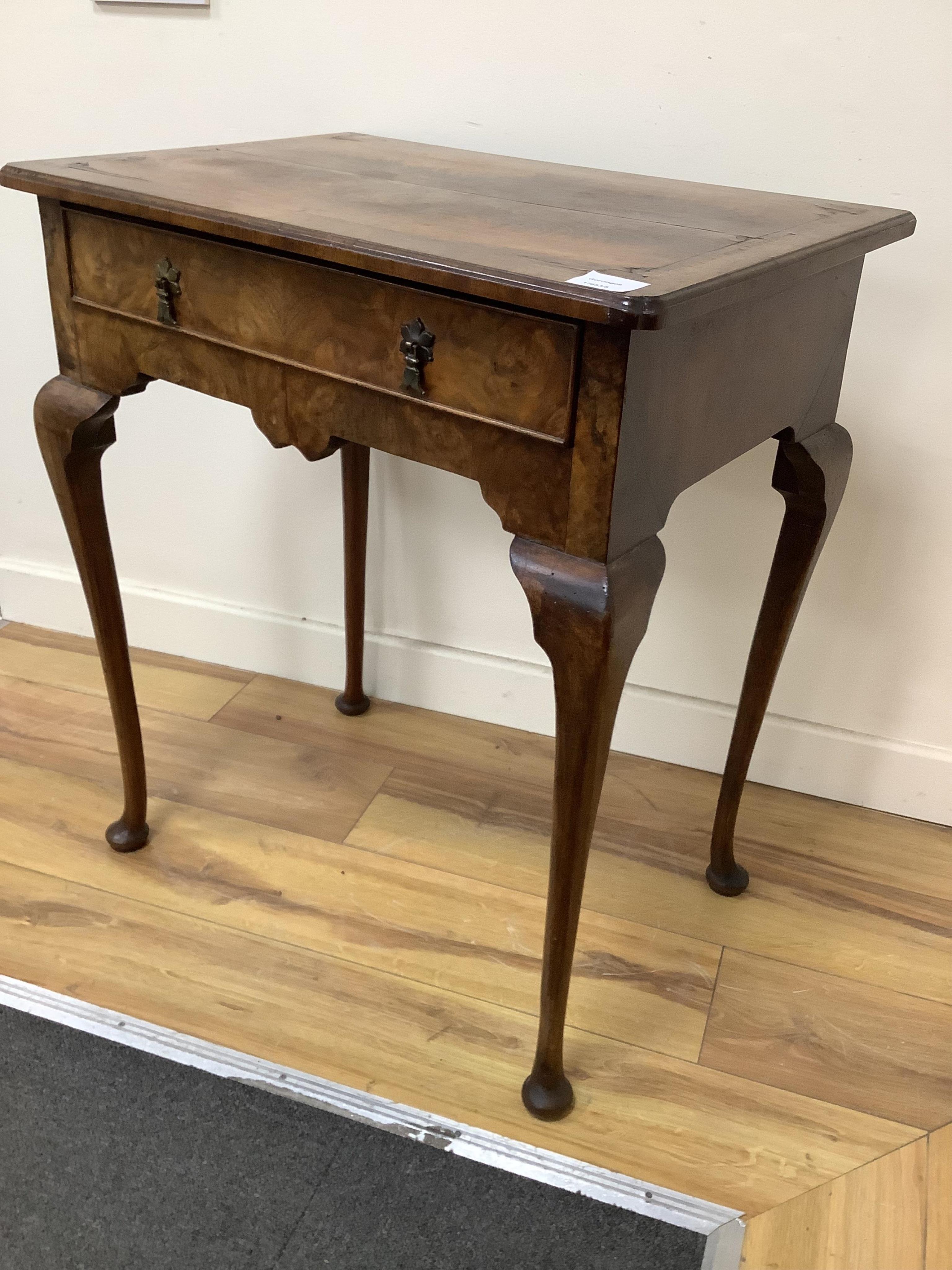 A George I style feather banded walnut side table, width 63cm, depth 44cm, height 71cm. Condition - fair